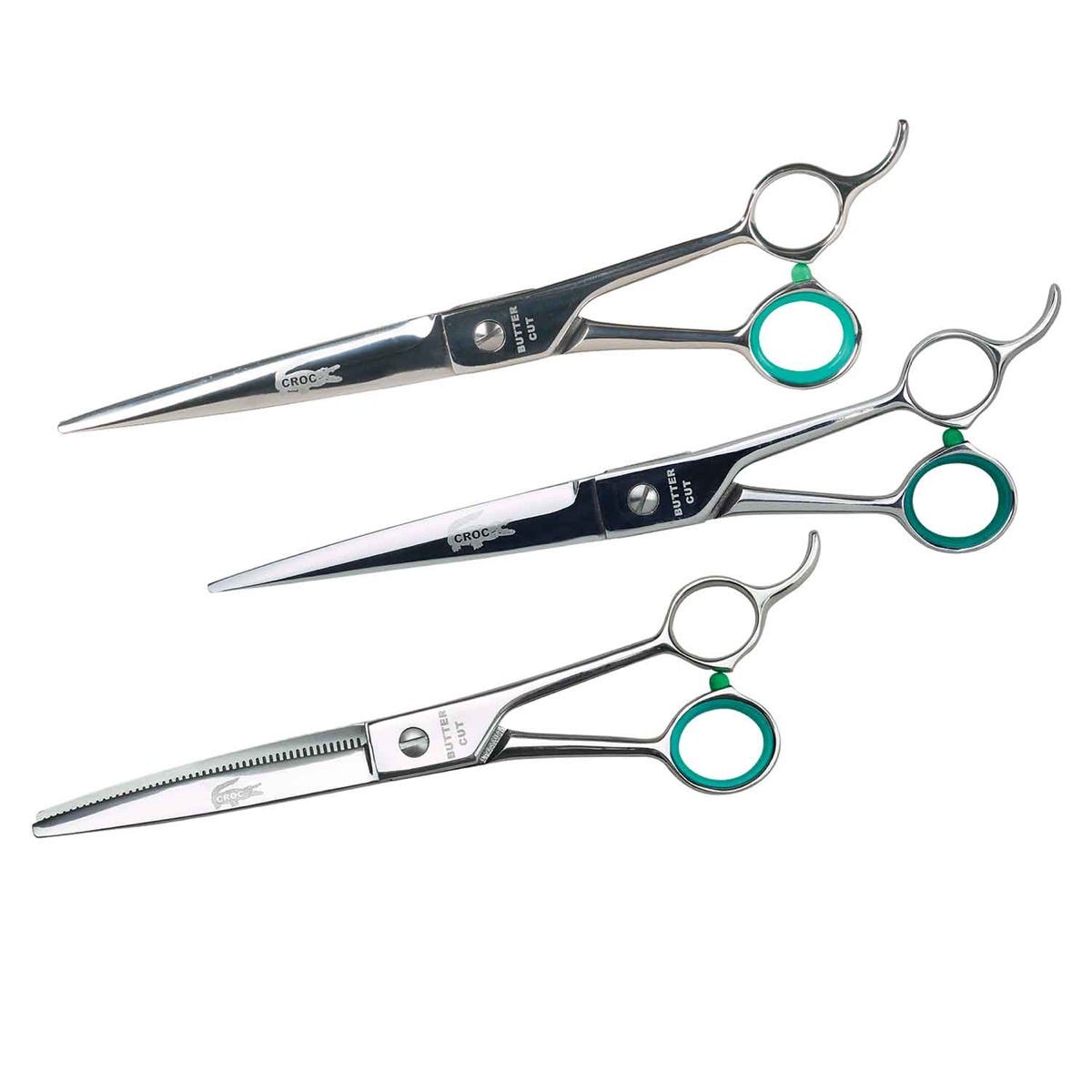 Three GE Crocodile shears: one straight, one curved, and one blender shear, with green finger inserts.